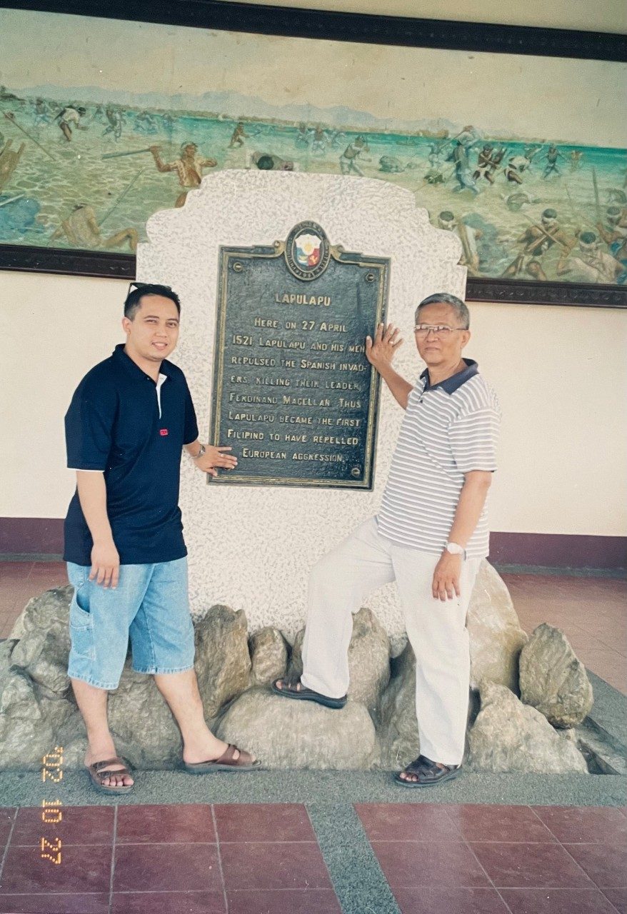 Macario and his dad at the Lapu-Lapu Monument in Lapu-Lapu, Philippines. 